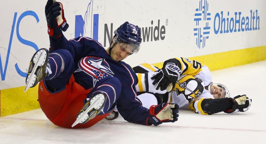 Doyle Somerby takes a tumble during a game against the Penguins