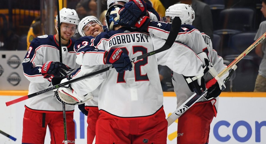 Sergei Bobrovsky celebrates with multiple players after a convincing win against the Nashville Predators during the preseason
