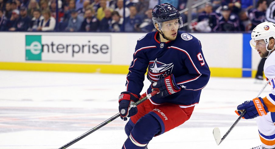 Artemi Panarin carries the puck for the Blue Jackets against the Islanders on opening night.