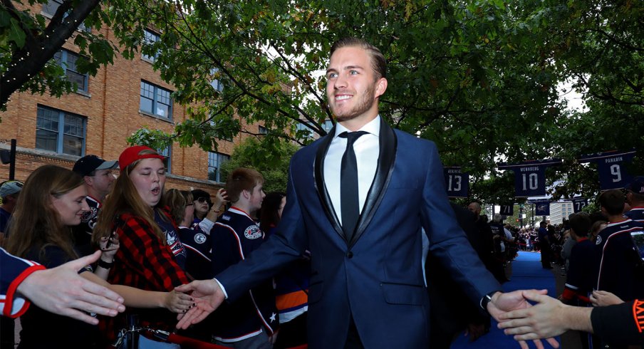 Alexander Wennberg walks on the blue carpet on Blue Jackets opening night.