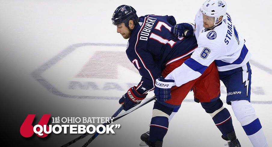 Brandon Dubinsky takes a check from Anton Stralman during the Blue Jackets 2-0 loss to the Tampa Bay Lightning.