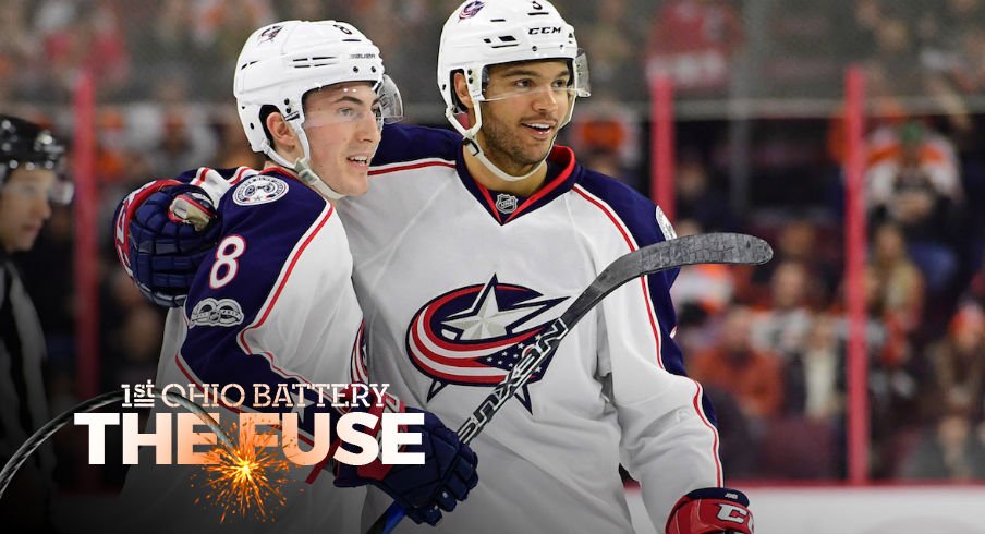 Blue Jackets defensemen Zach Werenski and Seth Jones