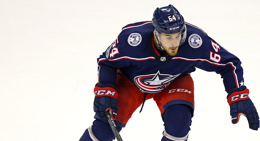 Tyler Motte skates with the puck during a game with the Columbus Blue Jackets