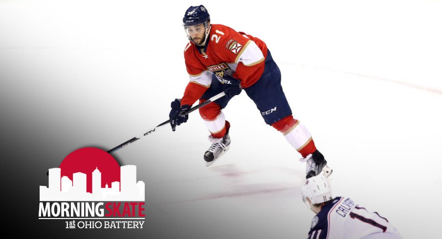Blue Jackets forward Matt Calvert defends Panthers center Vincent Trocheck