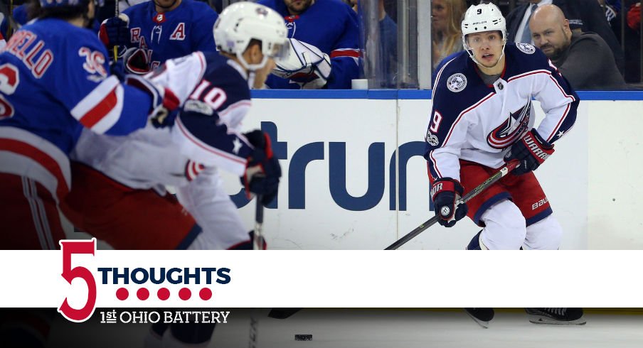 Artemi Panarin looks for a player to pass to during their game against the New York Rangers