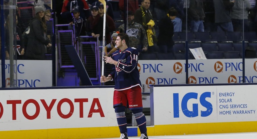 Pierre-Luc Dubois looks to give away a stick after being named to "Three Stars"