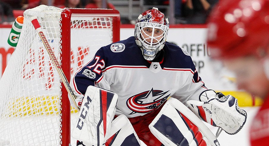 Sergei Bobrovsky stares down Dylan Larkin as he skates down the wing for Detroit. 