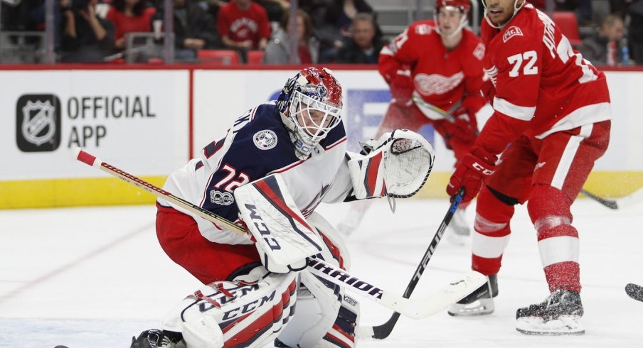 Sergei Bobrovsky tracks down a puck fed from Andreas Athanasiou