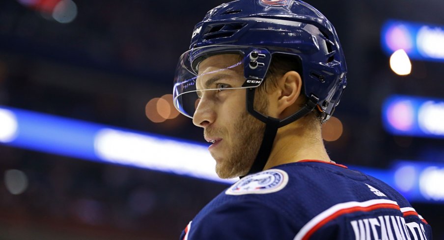 Alexander Wennberg stands around during pre-game warmups