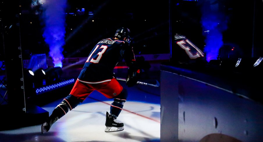 Cam Atkinson skates onto the ice during the Blue Jackets season opener 