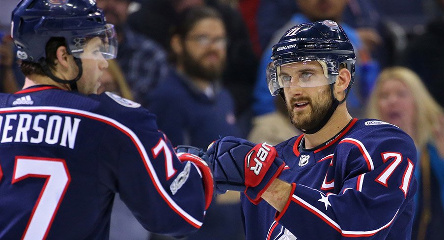 Nick Foligno and Josh Anderson fist-bump after a win over the New York Rangers