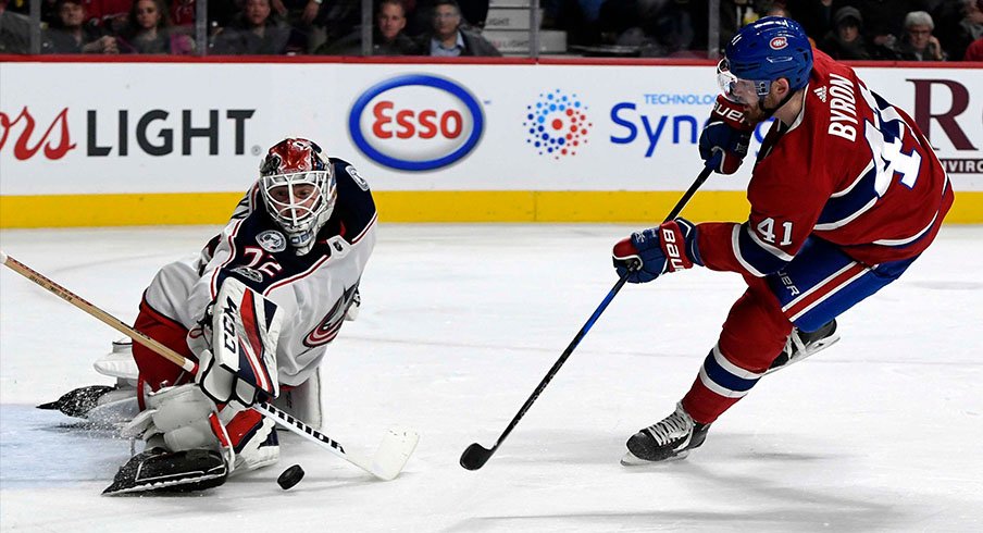 Sergei Bobrovsky makes a save against Paul Byron of the Montreal Canadiens