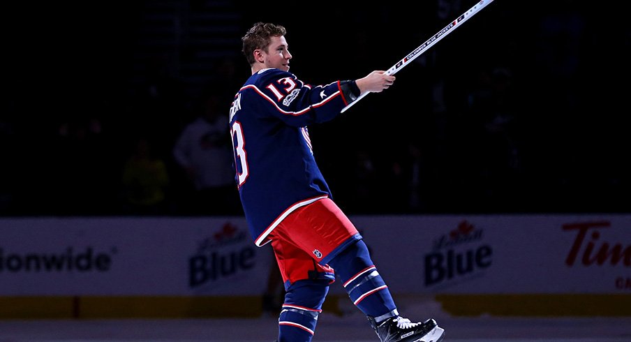 Cam Atkinson salutes the crowd after being named the game's first star in a Blue Jackets win over Ottawa