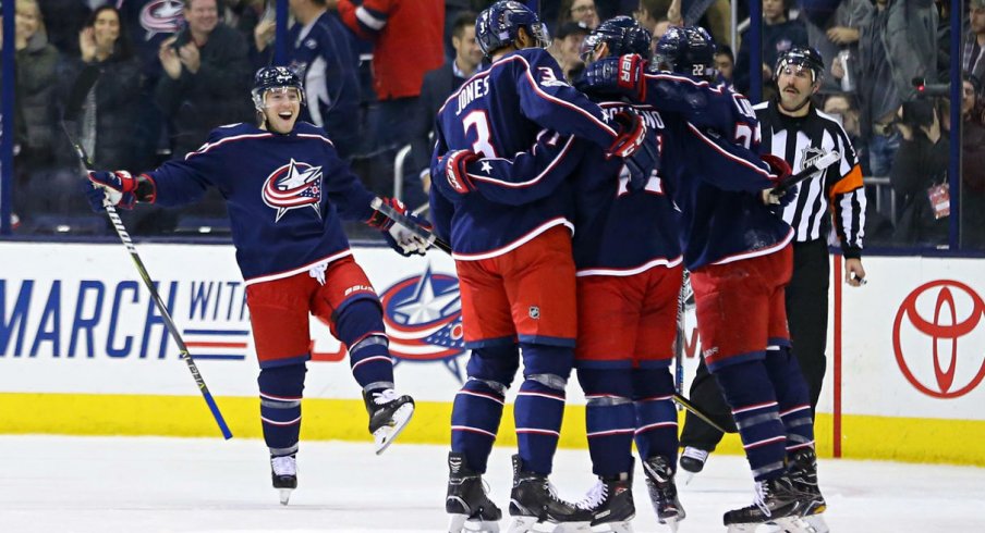 Nick Foligno celebrating with teammates