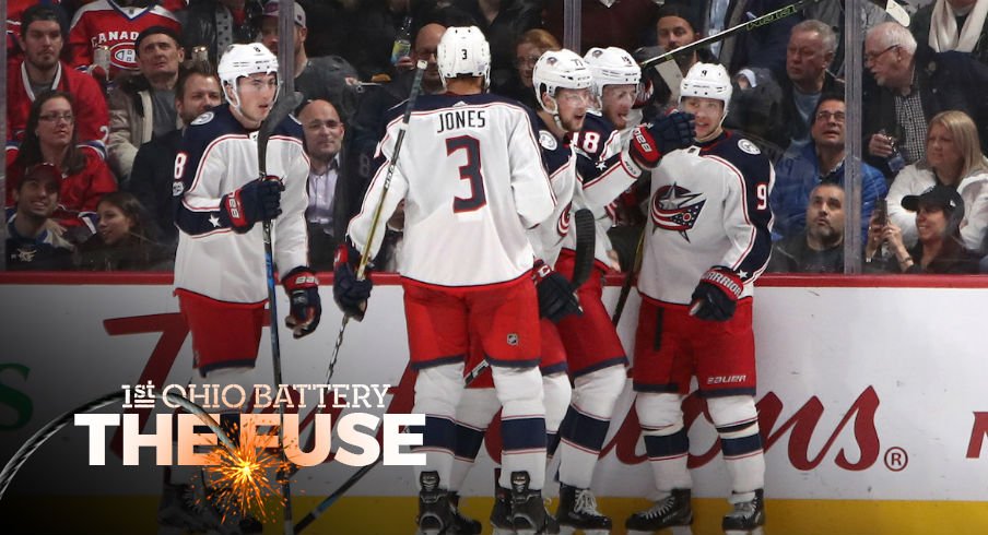 Blue Jackets celebrate a goal against the Montreal Canadiens