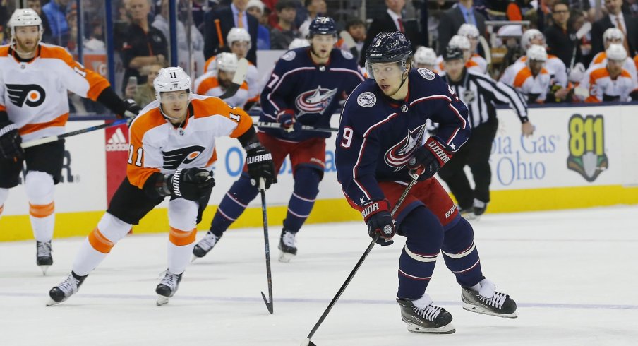 Artemi Panarin skates in the offensive zone and puts pressure on the Flyers