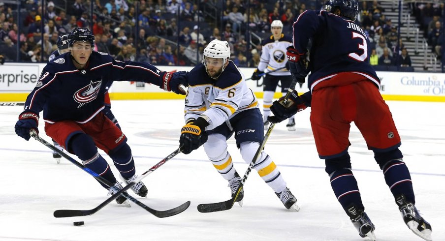 Blue Jackets defensemen Zach Werenski and Seth Jones 