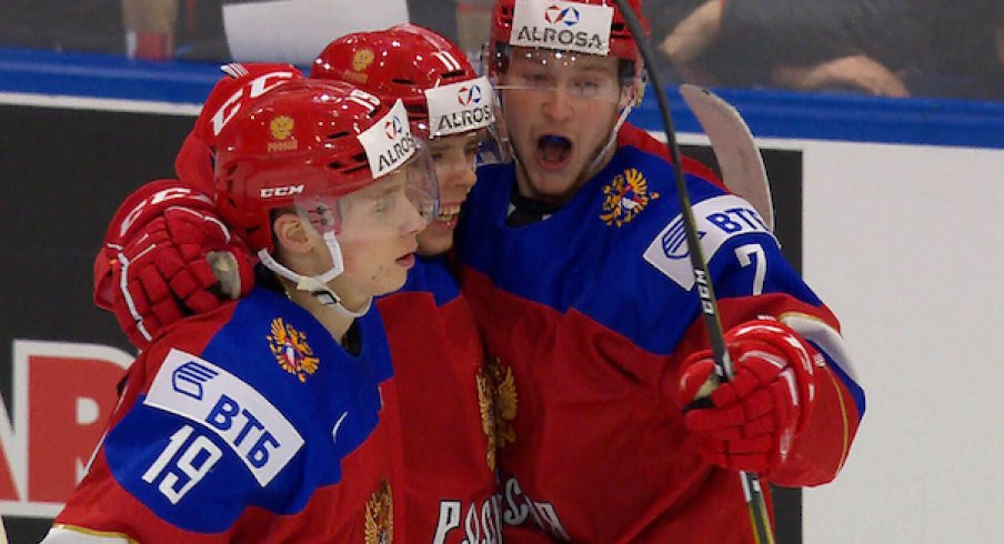 Vitaly Abramov celebrates with his Russian teammates at the World Juniors