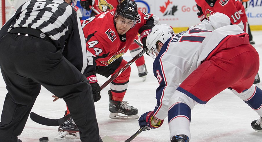 Pierre-Luc Dubois and Jean-Gabriel Pageau get set for a face off in the Blue Jackets loss to the Senators. 