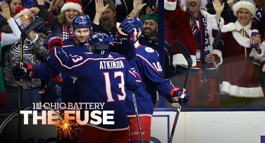 Blue Jackets celebrate a goal against the Maple Leafs