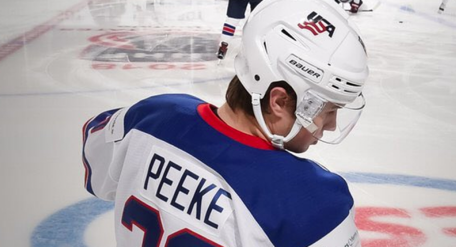 Andrew Peeke gets ready to skate for Team USA at the World Junior Championships