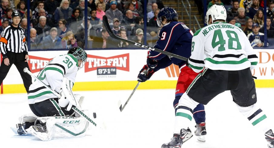 Artemi Panarin tries to put the puck past Stars goaltender Ben Bishop