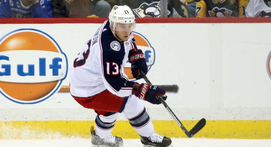 Cam Atkinson tries to enter the zone against the Pittsburgh Penguins