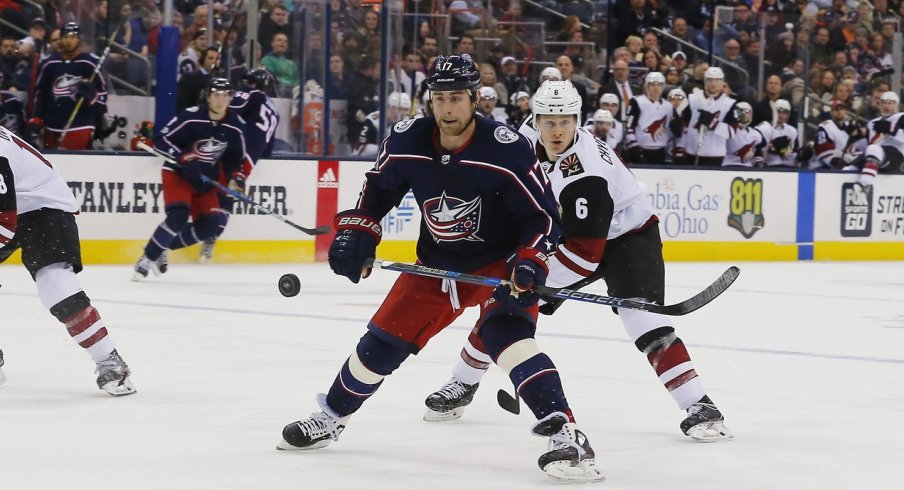 Brandon Dubinsky eyes the puck in a game against Arizona. 