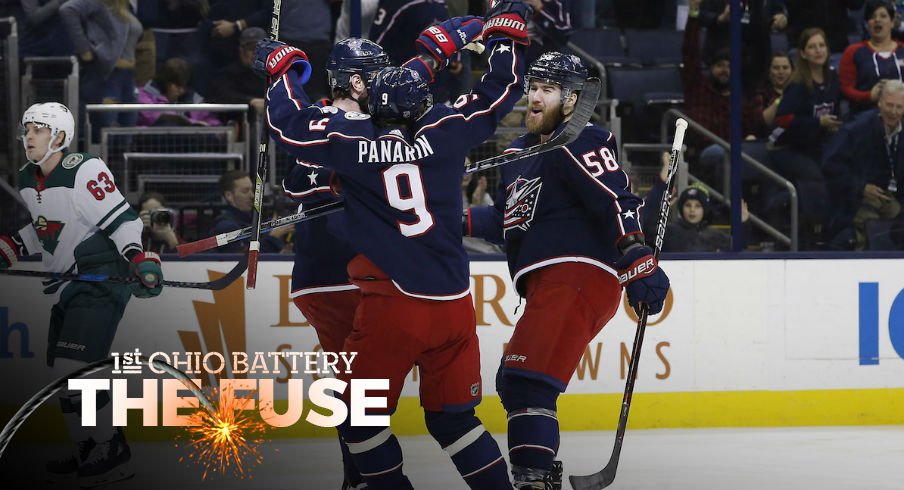 The Blue Jackets celebrate a goal scored by defenseman David Savard