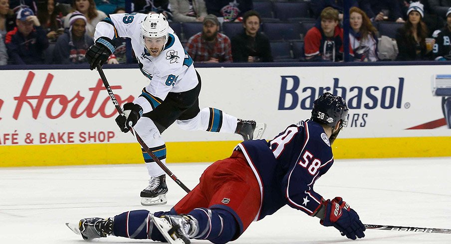 David Savard attempts to block a pass against the San Jose Sharks. 