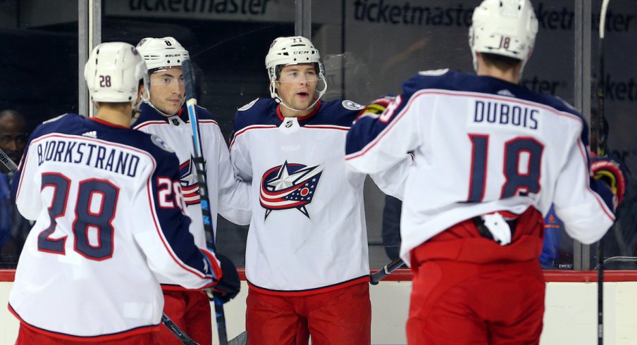 Blue Jackets celebrate a goal against the New York Islanders