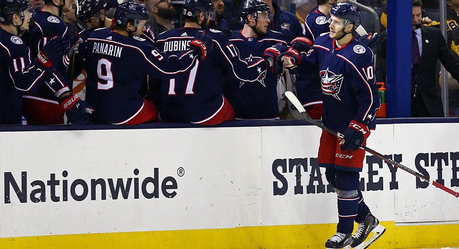 Alexander Wennberg celebrates a goal.