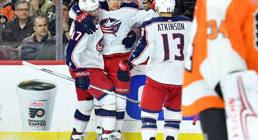 Artemi Panarin celebrate scoring against the Flyers 