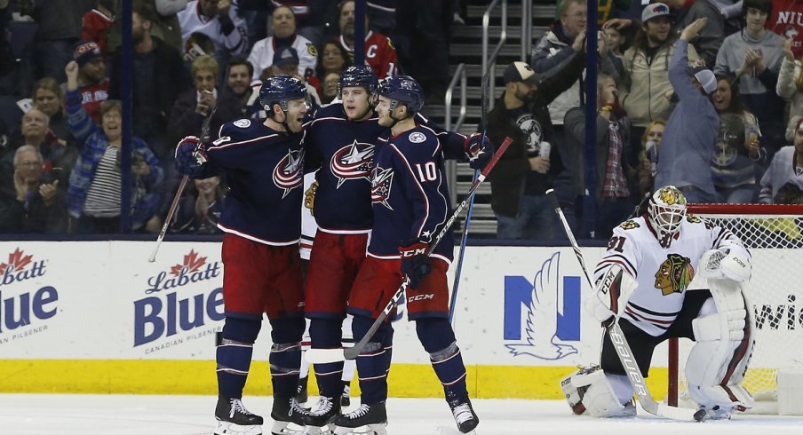 Josh Anderson celebrates with teammates