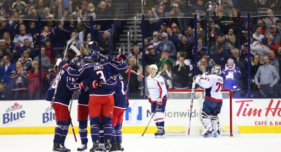 Blue Jackets celebrate a power play goal against the Washington Capitals