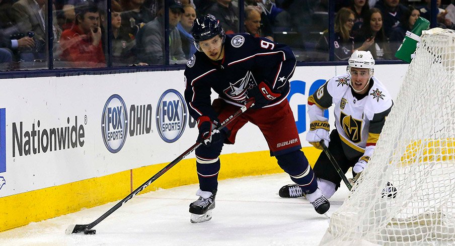 Artemi Panarin carries the puck against the Vegas Golden Knights