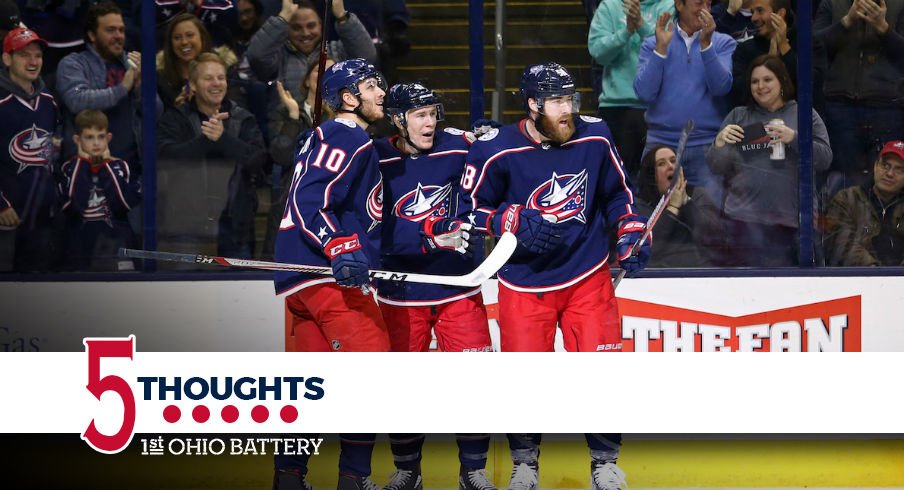 Blue Jackets celebrate a goal against the Detroit Red Wings