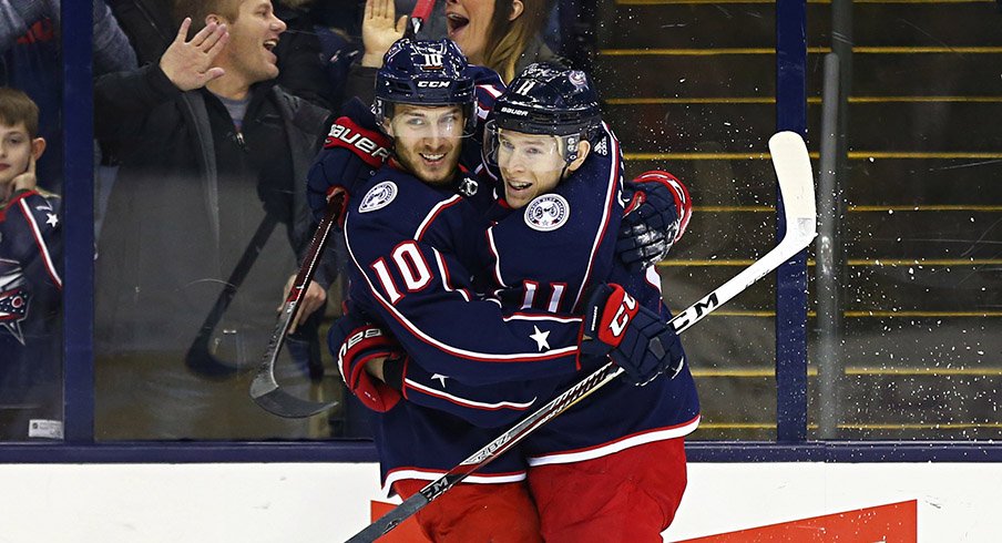 Matt Calvert and Alexander Wennberg celebrate a shorthanded goal against the Detroit Red Wings. 