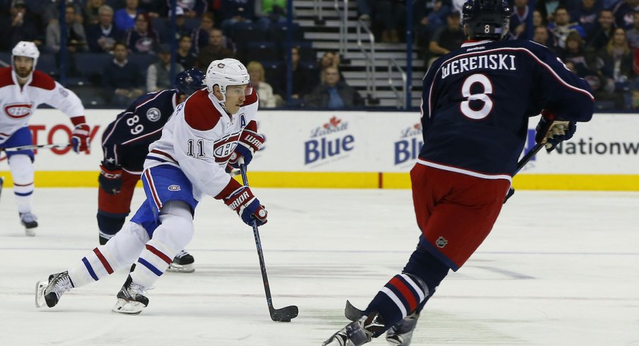 Blue Jackets Zach Werenski tries to pursue Canadiens Brendan Gallagher