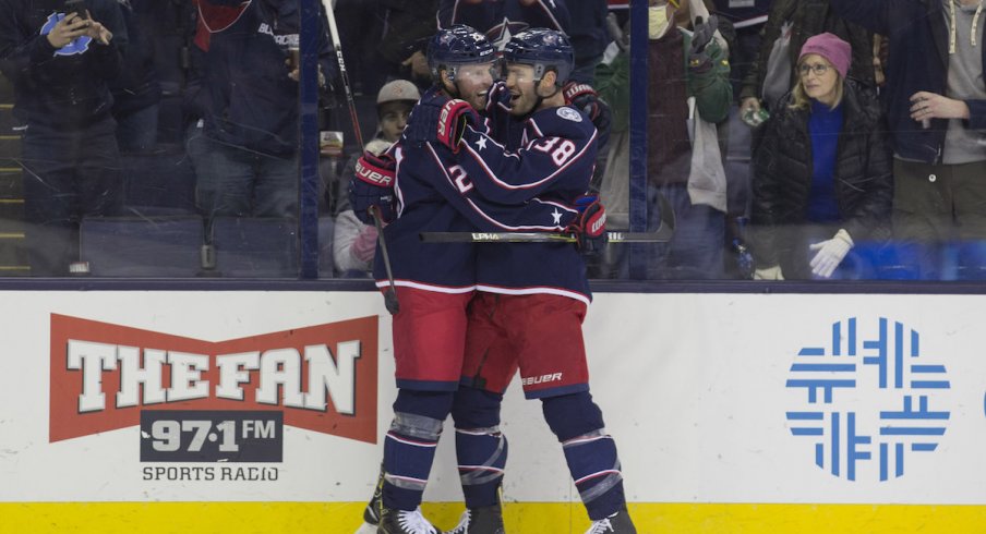 Boone Jenner and Thomas Vanek celebrate a Blue Jackets goal against the Ottawa Senators