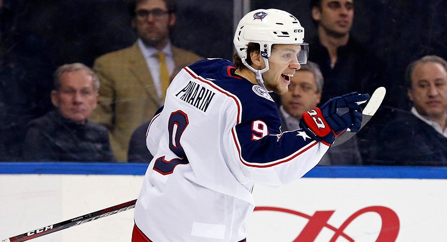 Artemi Panarin celebrates his hat trick against the New York Rangers