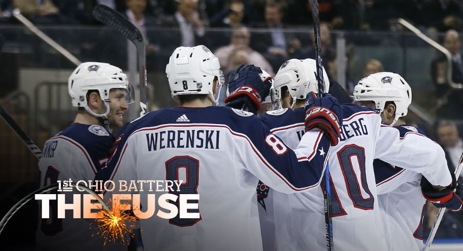 The Blue Jackets celebrate a goal against the New York Rangers.