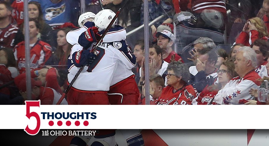 Matt Calvert and Brandon Dubinsky celebrate the game-winning goal in Game 2 of the series between the Columbus Blue Jackets and the Washington Capitals. 