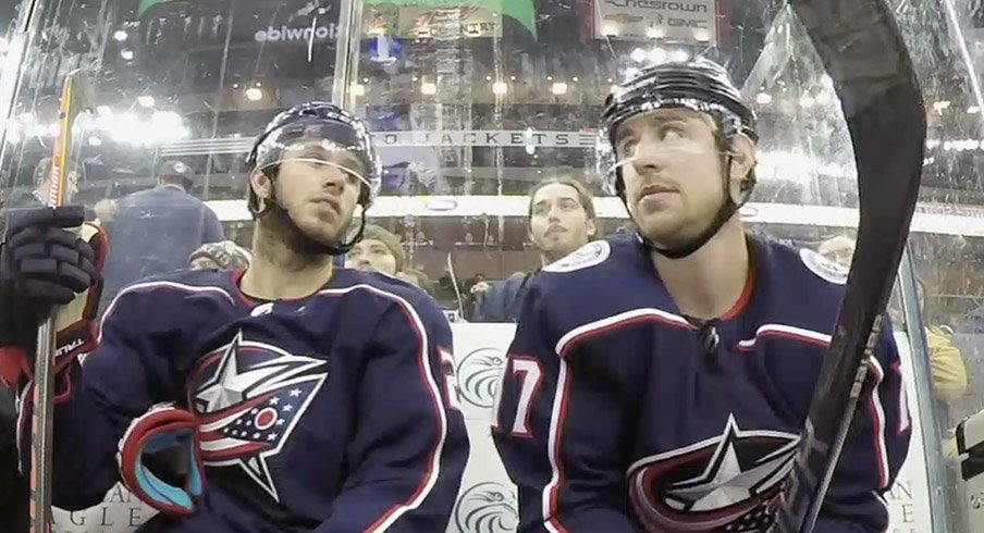 Brandon Dubinsky and Ryan Murray in the penalty box.