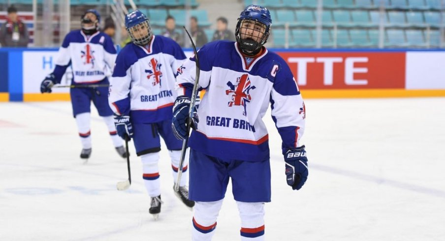 Liam Kirk of Team Great Britain celebrates scoring a goal at the World Junior D2 Tournament 