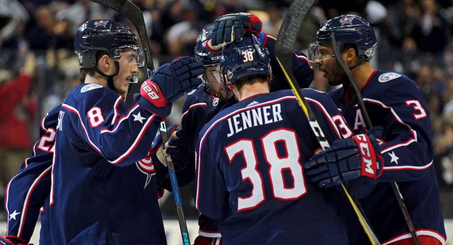 Blue Jackets celebrate a goal against the Washington Capitals in the first round of the Stanley Cup playoffs at Nationwide Arena.