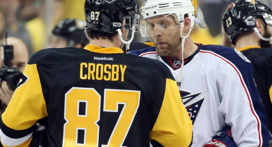 Jack Johnson and Sidney Crosby, soon-to-be teammates, shake hands after their first-round series in the 2017 Stanley Cup playoffs.