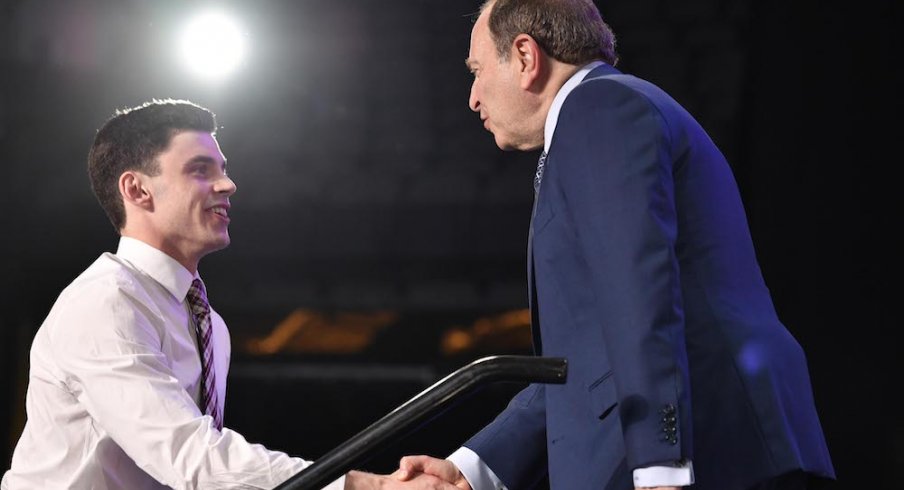 Blue Jackets first-round NHL Draft pick Liam Foudy meets NHL commissioner Gary Bettman.
