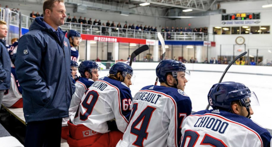 Cleveland Monsters head coach John Madden guides the Blue Jackets prospects in Traverse City, Michigan.