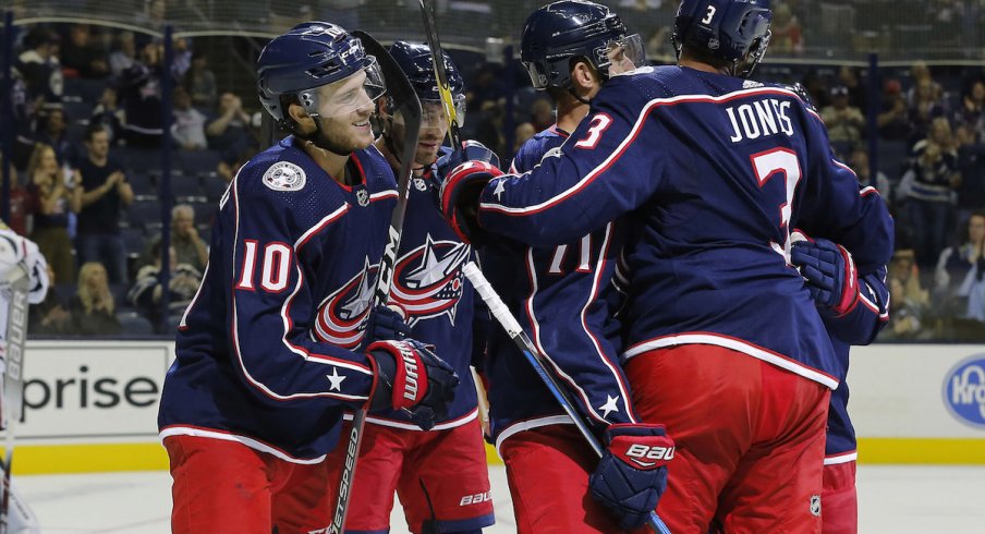 Alexander Wennberg and the Columbus Blue Jackets celebrate a power play goal scored against the Chicago Blackhawks at Nationwide Arena.